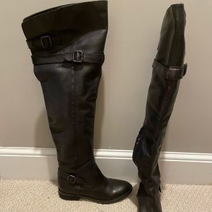Over the knee riding boots.